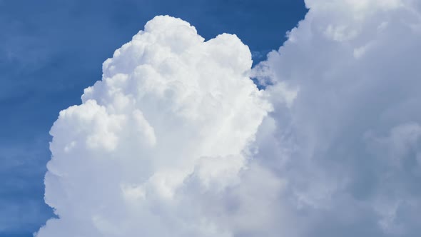 Timelapse of White Puffy Cumulus Clouds Forming on Summer Blue Sky