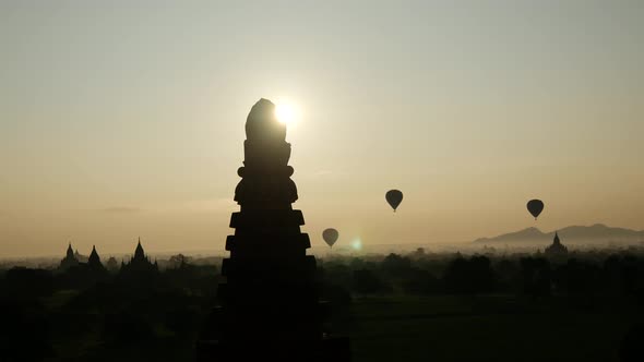 Balloons flying during sunrise