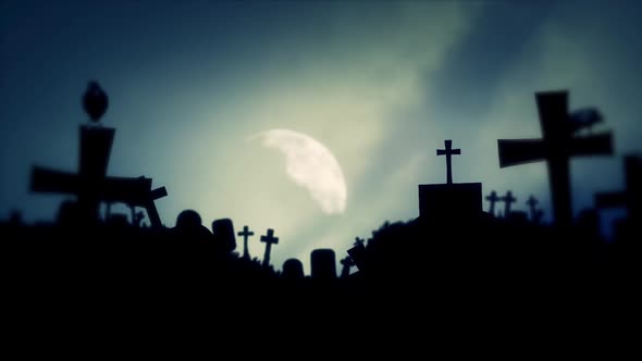 Creepy Cemetery and Ravens on a Spooky Night with Full Moon