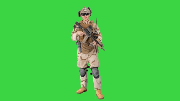 Soldier Standing and Talking To You on a Green Screen, Chroma Key.