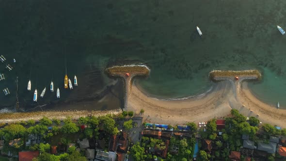 Aerial view above of coastal beach at Bali island, Indonesia.