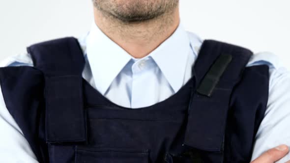 Security guard wearing bulletproof vest on white background