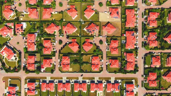 New development real estate. Aerial view of residential houses and driveways neighborhood during sun