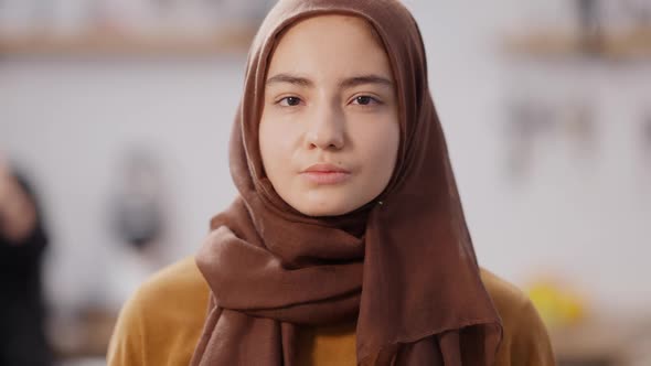 Closeup Portrait of Confident Serious Beautiful Middle Eastern Woman Looking at Camera