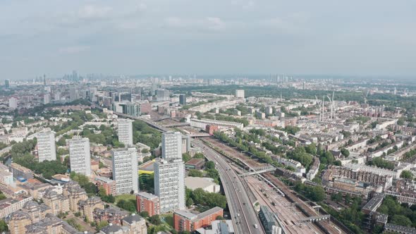 dolly forward drone shot over Westway ringroad towards London paddington station