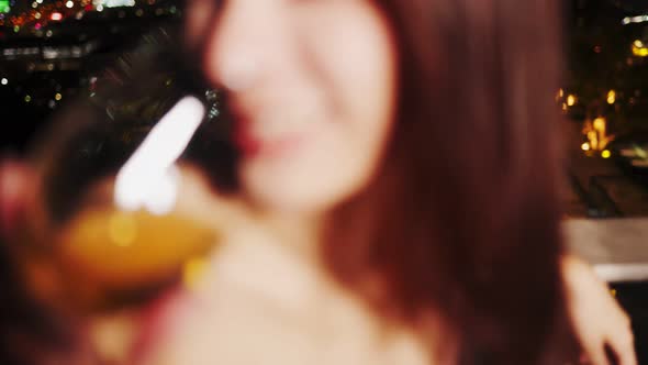 Young asian woman with sparklers is dancing and celebrating a new year. Fireworks,