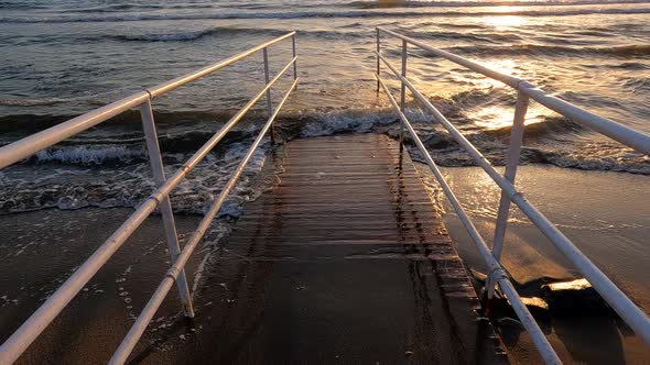 Slow Motion Shoot On Sea Waves On Pier