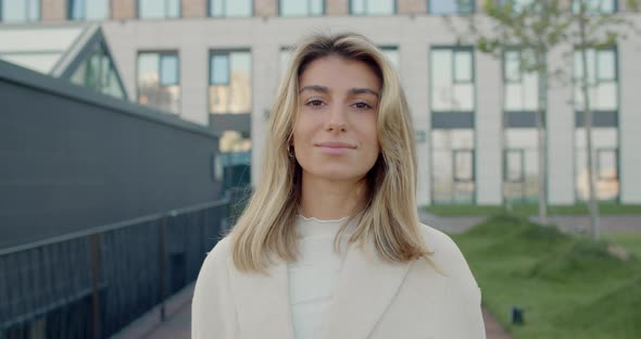 Crop View of Attractive Confident Woman with Blond Hair Looking To Camera. Stylish Female Person