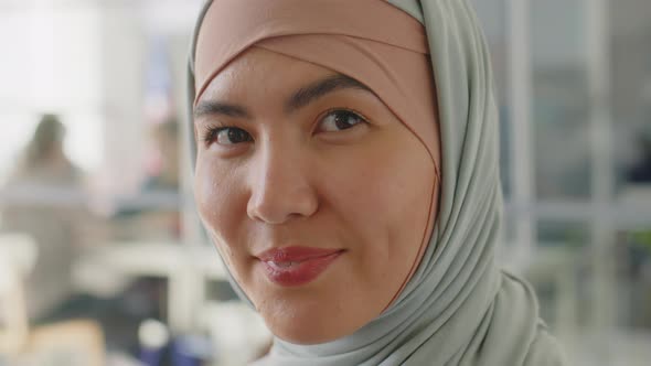 Portrait of Muslim Woman in Hijab in Embassy Office