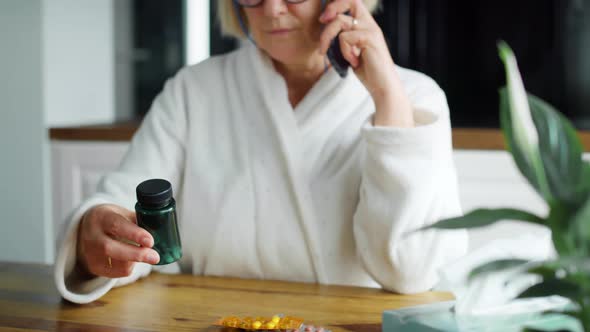 Video of senior woman calling the doctor. Shot with RED helium camera in 8K.