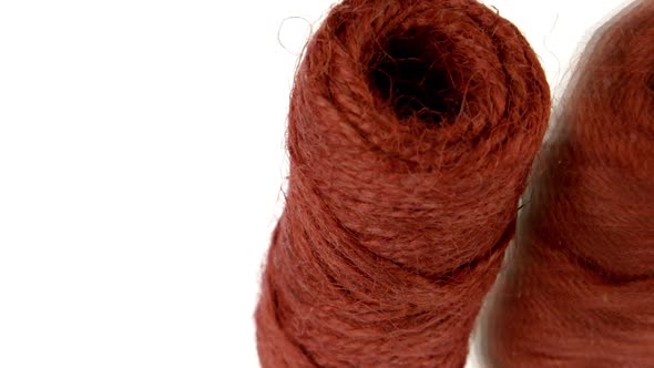 Vertical Video Skein of Red Jute Twine Rotating on Isolated White Background