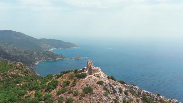 Aerial View of Ancient and Medieval Building on the Top of Mountainrocky Coastline with Green