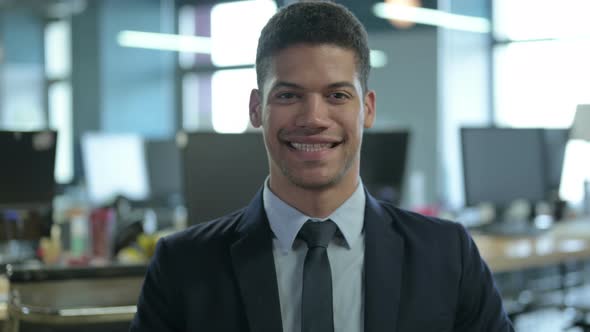 Portrait of African Businessman Smiling at Camera