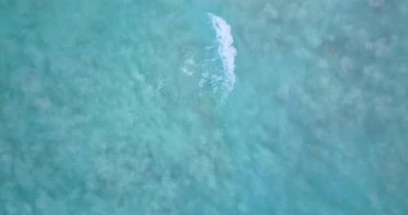 Beautiful drone abstract shot of a white sand paradise beach and aqua turquoise water background in 