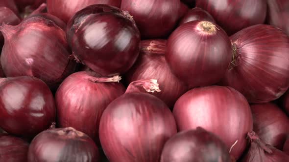 Rotating Red Onions Background