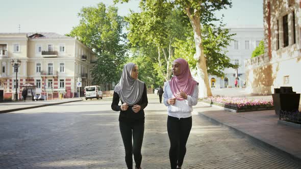 Two Muslim Women in Sportswear and Colorful Hijabs