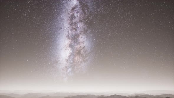 Milky Way Above Snow Covered Terrain alt