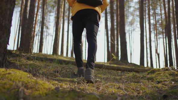 Close Up of Men Legs Hiking Steep Terrain in Slow Motion