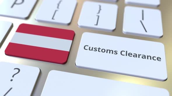 CUSTOMS CLEARANCE Text and Flag of Austria on the Computer Keyboard