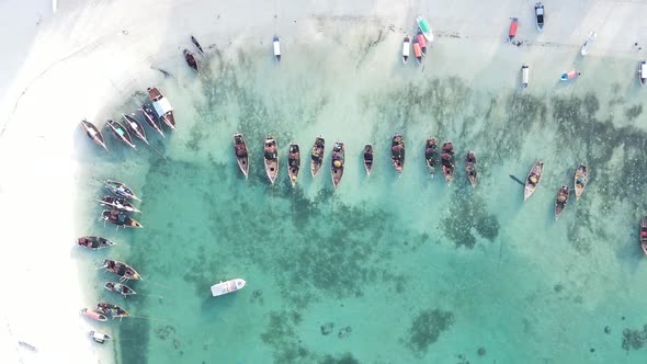 Vertical Video Boats in the Ocean Near the Coast of Zanzibar Tanzania Aerial View