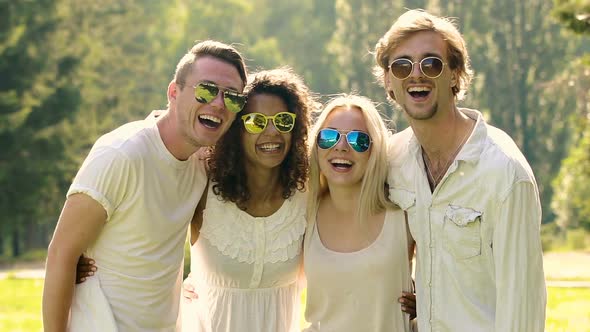 Healthy Smiles on Faces of Happy Young People in Clean White Clothes, Friendship