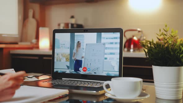 Online Video Conference on Laptop with Female Speaker in Home Office