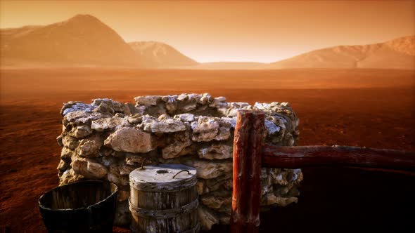Old Stone Water Well in the Desert alt