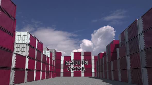 Many Cargo Containers with MADE IN QATAR Text and Flags