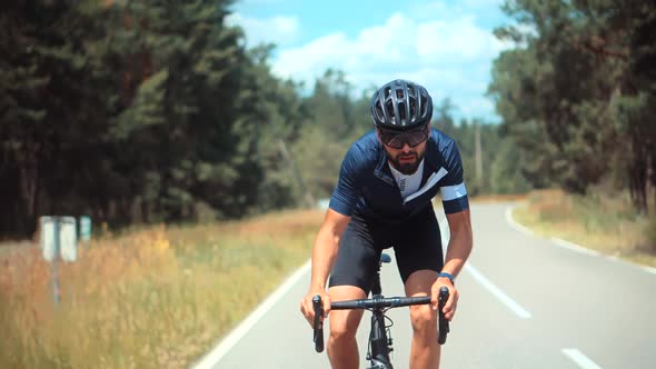 Cyclist Training On Bicycle. Cyclist Fitness Riding On Road Bike And Getting Ready For Triathlon.