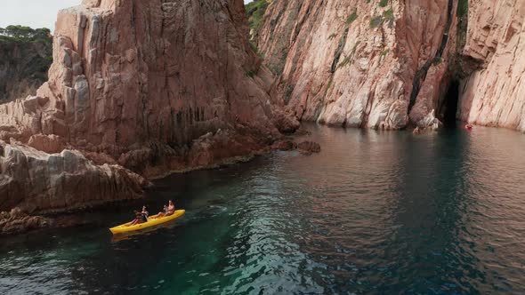 Double canoe sailing through sea