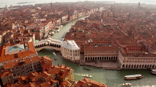 narrow canals and orange rooftops in Venice