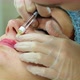The Cosmetologist Makes Injections on the Client's Face in the Lip Area - VideoHive Item for Sale