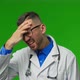 Exhausted Young Doctor in Coat Has Headache From Fatigue and Overexertion From Working in Heavy - VideoHive Item for Sale