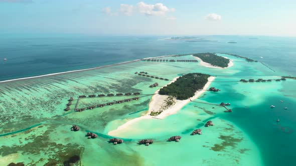 Aerial view maldives islands with water villas