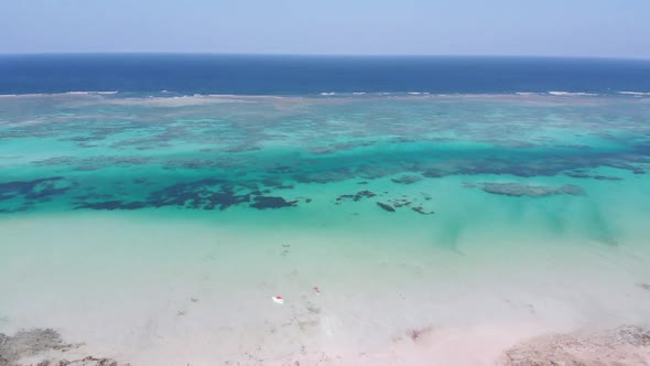 Paradise Tropical Shore and Barrier Reef in Ocean Sandbanks Zanzibar Aerial View