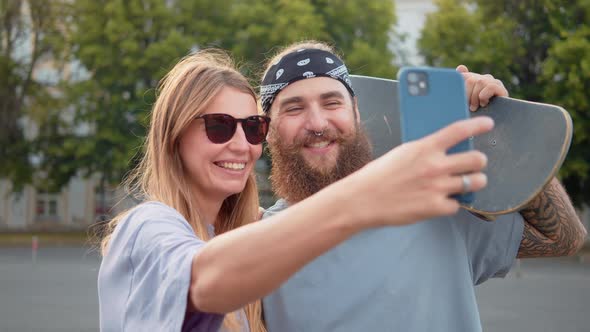 Active Young Millennial Friends Walking Outside Chatting Online Park Outdoors