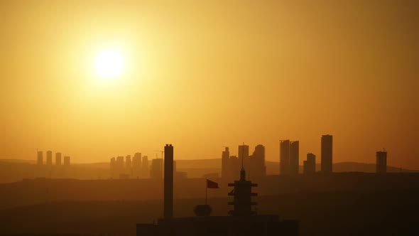 8K Cloudless Sunset Through City Skyscrapers