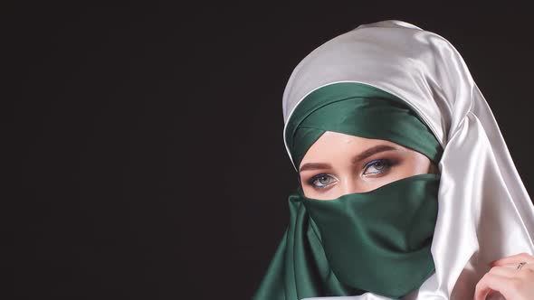Portrait of an Attractive Young Modern Muslim Woman in Hijab