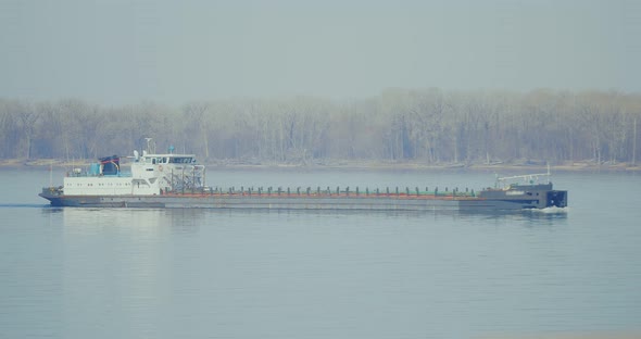 Cargo Barge Floats on the River