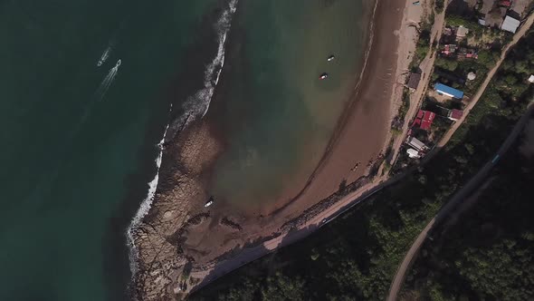 Scenic Aerial View Of A Beautiful Beach With Turquoise Blue Sea Water - Puerto Lopez In Ecuador - to