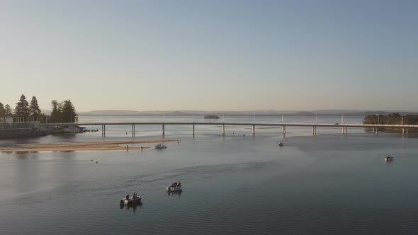 zoom out aerial view of the entrance bridge