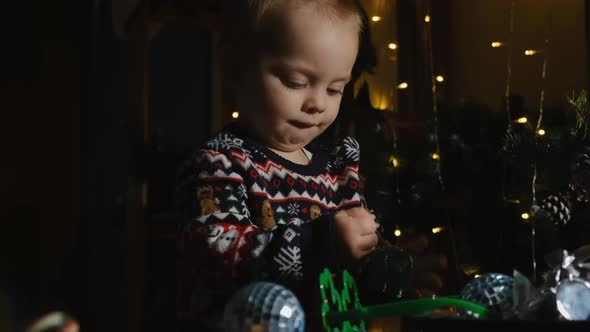 Toddler Boy Unpacking Christmas Present