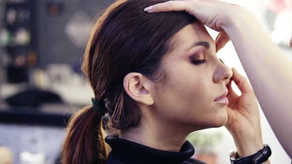 Gorgeous Caucasian Looking Brunette Girl Gets Her Eye Make Up Done By a Professional at a Beauty