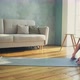 Woman in Sportswear Lies Down on Mat Do Sports Exercises - VideoHive Item for Sale