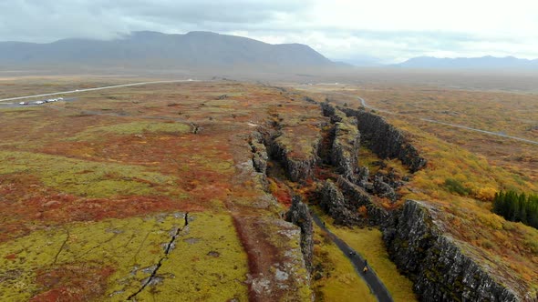 Autumn Landscape in Iceland, Rocky Canyon on Background of Mountain, Drone Shot