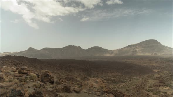 Clouds rolling over mountain range in Tenerife, Teide national park