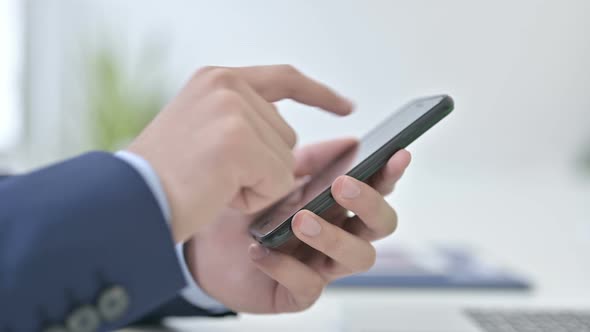 Close Up of Businessman Using Smartphone