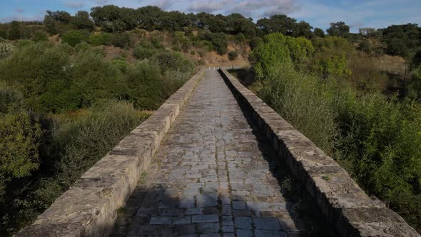 Low altitude aerial fpv along Roman bridge at Vila Formosa In Portugal