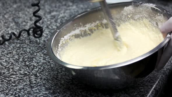 Liquid Creamy Dough Stirring