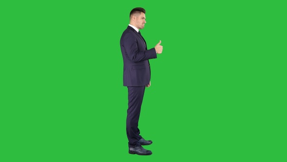 Businessman Showing Thumbs up On a Green Screen, Chroma Key